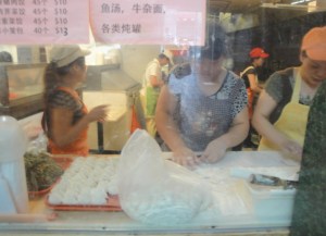 Girls making the dumplings
